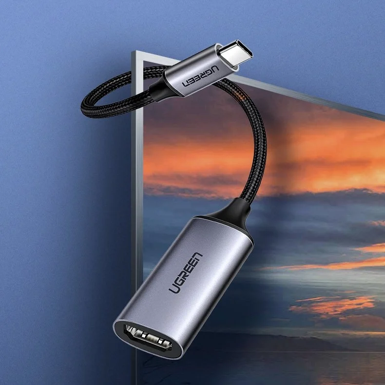 Câble Adaptateur UGREEN 70444 Maroc Câble Adaptateur USB C vers HDMI Maroc, L'adaptateur de câble HDMI de type C est doté d'un cadre en aluminium élégant et d'un mini câble tressé en nylon qui donnent un look élégant et moderne à cet adaptateur vidéo ultra-mince