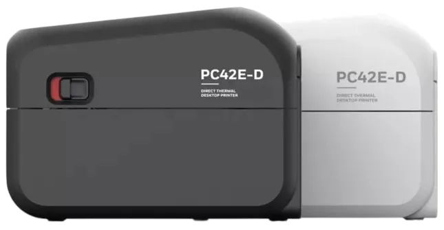 Honeywell PC41e-D Imprimante d'étiquettes thermique directe 203 dpi USB (PC41EDB010200) 26 PC41EDB010200 Maroc Honeywell PC41e-D Maroc Imprimante thermique Maroc Imprimante Imprimante d’étiquettes thermique Maroc, Disponible en noir ou blanc (selon le modèle) pour une intégration parfaite dans les espaces de vente et de stockage. Ses bords arrondis renforcent sa robustesse et lui permettent de résister aux rigueurs d'une utilisation quotidienne tout en conservant une apparence professionnelle